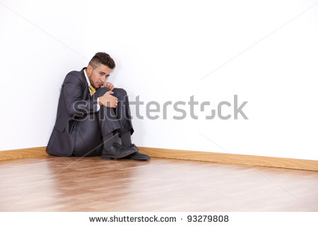 stock-photo-businessman-at-the-corner-of-his-office-room-with-fear-93279808.jpg